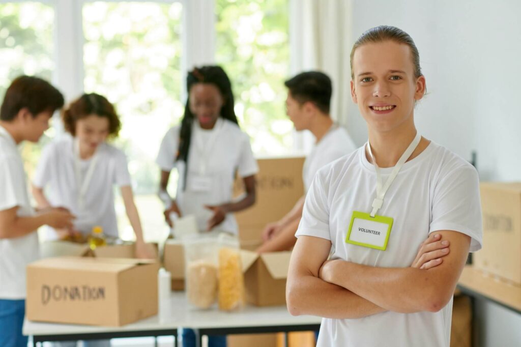 Home smiling volunteer of charity organization 1024x682